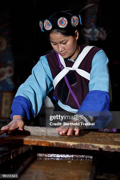 china paper making - tribal head gear in china stock pictures, royalty-free photos & images