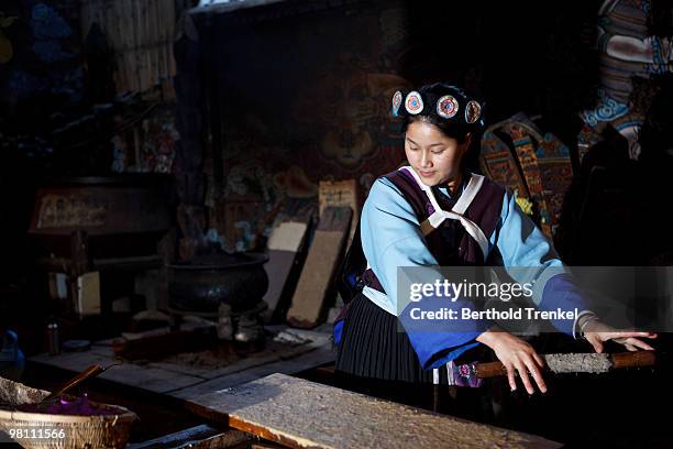china paper making - tribal head gear in china stock pictures, royalty-free photos & images