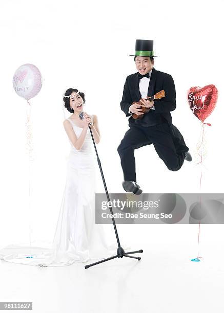 singing married couple - newfamily stock pictures, royalty-free photos & images