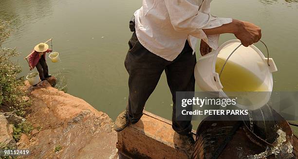 To go with feature story China-environment-drought by Dan Martin In a picture taken on March 24, 2010 Chinese peasant farmer Dong Guicheng and his...