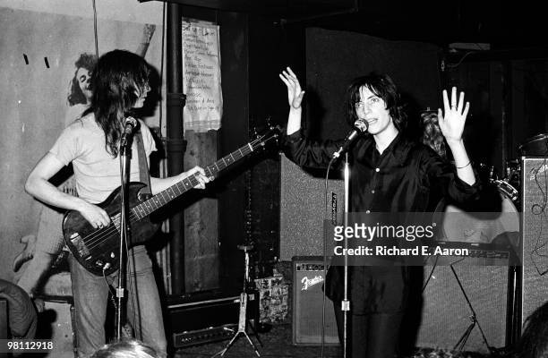 Patti Smith performing with Lenny Kaye from the Patti Smith Group at CBGB's club in New York City on April 04 1975