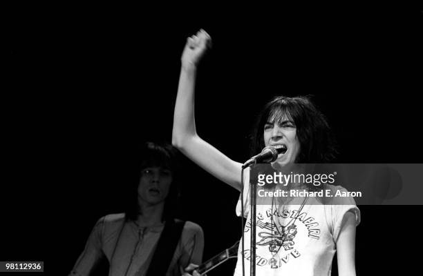 Patti Smith performs with Ivan Kral from The Patti Smith Group live on stage in Central Park, New York on July 09 1976