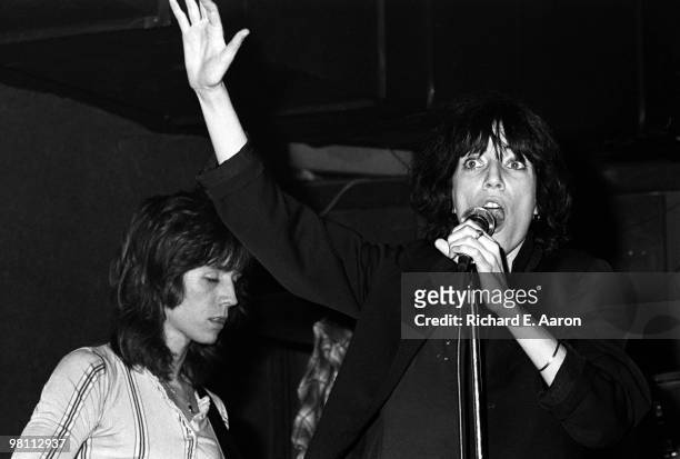 Patti Smith performing with Ivan Kral from the Patti Smith Group at CBGB's club in New York City on April 04 1975