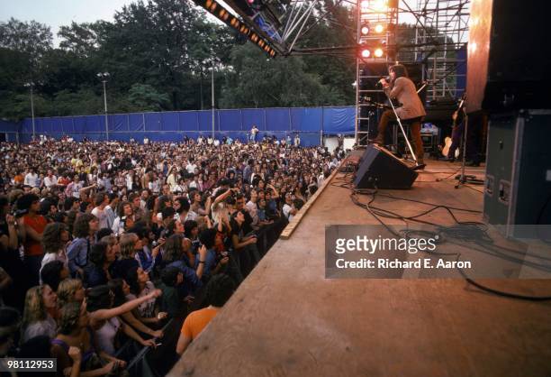 Patti Smith performing on stage with The Patti Smith Group in Central Park as part of The Dr Pepper Music Festival on August 04 1978