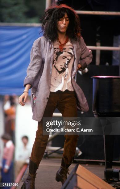 Patti Smith performs live on stage with The Patti Smith Group in Central Park as part of The Dr Pepper Music Festival on August 04 1978
