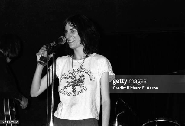 Patti Smith performs with Ivan Kral from The Patti Smith Group live on stage in Central Park, New York on July 09 1976