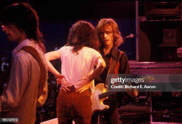 Patti Smith performing on stage with The Patti Smith Group in Central Park as part of The Dr Pepper Music Festival on August 04 1978 L-R Lenny Kaye,...