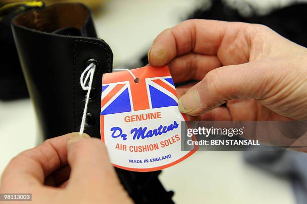 Dr Martens boots are pictured in the Dr Martens factory in Wellingborough, Northamptonshire, in central England, on March 18, 2010. What do British...