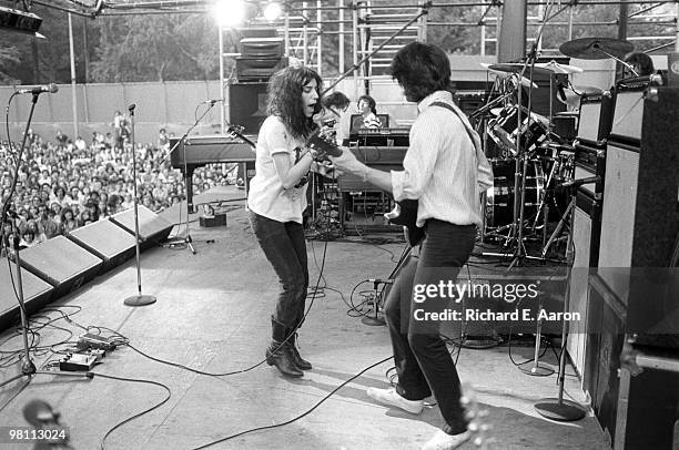 Patti Smith performing on stage with The Patti Smith Group in Central Park as part of The Dr Pepper Music Festival on August 04 1978 L-R Patti Smith,...