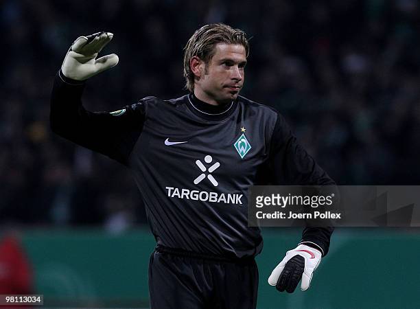 Tim Wiese of Bremen gestures during the DFB Cup Semi Final match between SV Werder Bremen and FC Augsburg at Weser Stadium on March 23, 2010 in...