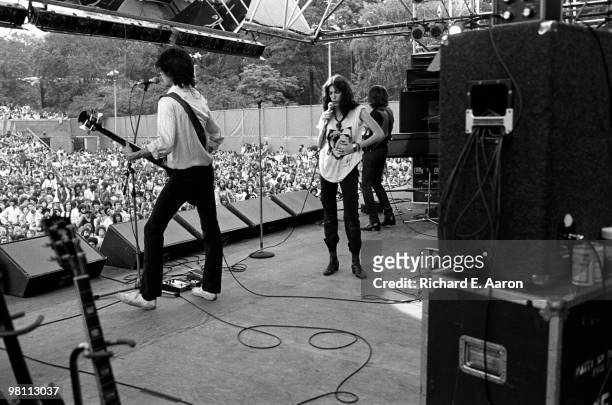 Patti Smith performing on stage with The Patti Smith Group in Central Park as part of The Dr Pepper Music Festival on August 04 1978 L-R Lenny Kaye,...