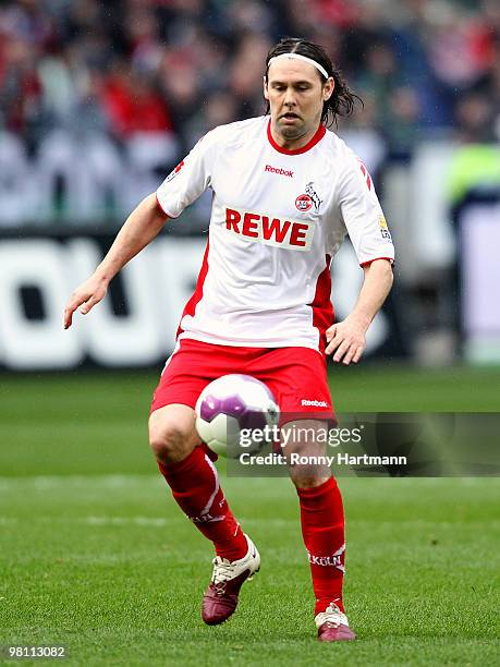 Maniche of Koeln controls the ball during the Bundesliga match between Hannover 96 and 1. FC Koeln at AWD Arena on March 27, 2010 in Hanover, Germany.