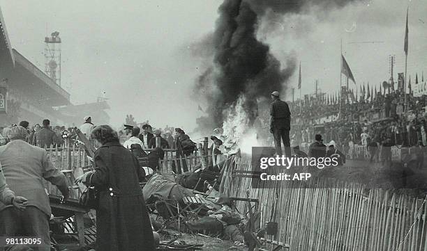 View of the crash of the Mercedes Benz 300 SLR of French pilot Pierre Levegh that hit the stands and exploded, on June 11, 1955 during the 23th...