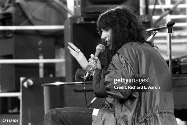 Patti Smith performing on stage with The Patti Smith Group in Central Park as part of The Dr Pepper Music Festival on August 04 1978