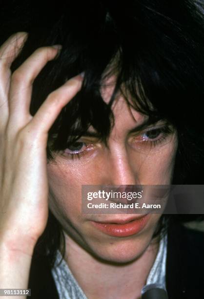 Patti Smith posed at a poetry reading night at a club called Local in New York City in 1975