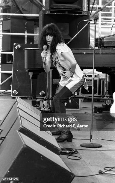 Patti Smith performs live on stage with The Patti Smith Group in Central Park as part of The Dr Pepper Music Festival on August 04 1978