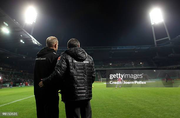 Head coach Thomas Schaaf and Manager Klaus Allofs of Bremen are seen prior to the DFB Cup Semi Final match between SV Werder Bremen and FC Augsburg...