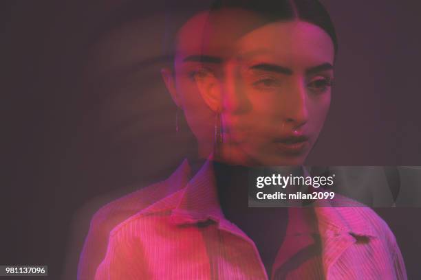 portrait of a young woman - long exposure face stock pictures, royalty-free photos & images