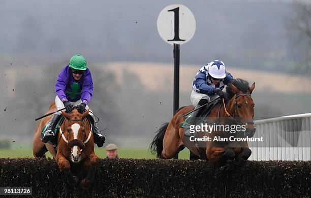 Freddies Return ridden by Jason Maguire jump the last before going on to win The gg.com Beginners' Steeple Chase from Picture In The Sky at Towcester...
