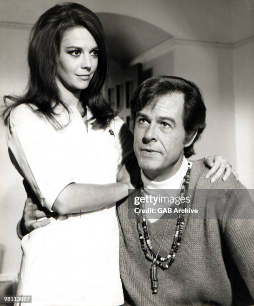 American actors Natalie Wood and Robert Culp posed together in a promotional still from the film, 'Bob & Carol & Ted & Alice,' directed by Paul...