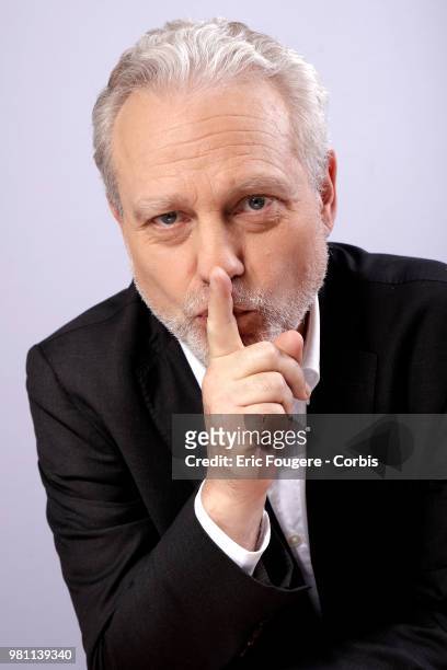 Journalist and writer Yves Bigot poses during a portrait session in Paris, France on .