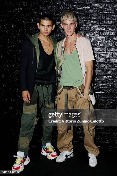 Models pose backstage ahead of the Dsquared2 show during Milan Men's Fashion Week Spring/Summer 2019 on June 17, 2018 in Milan, Italy.