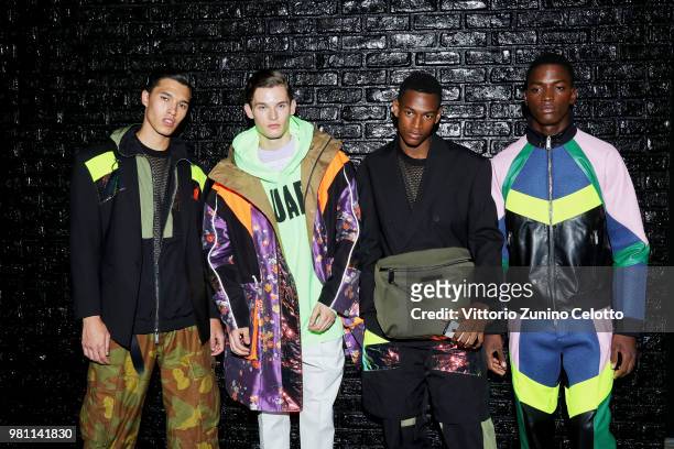 Models pose backstage ahead of the Dsquared2 show during Milan Men's Fashion Week Spring/Summer 2019 on June 17, 2018 in Milan, Italy.