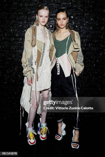 Models pose backstage ahead of the Dsquared2 show during Milan Men's Fashion Week Spring/Summer 2019 on June 17, 2018 in Milan, Italy.