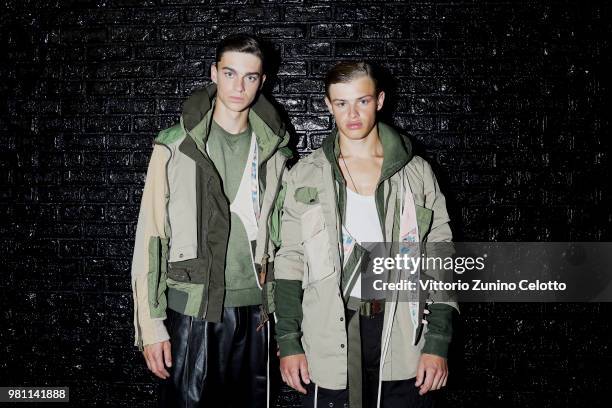 Models pose backstage ahead of the Dsquared2 show during Milan Men's Fashion Week Spring/Summer 2019 on June 17, 2018 in Milan, Italy.