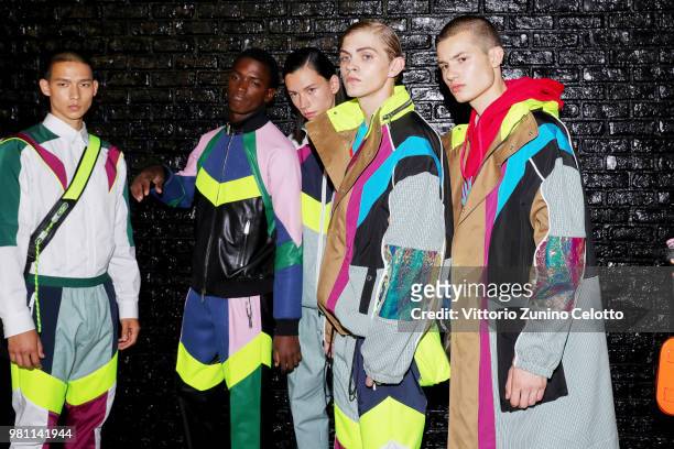Models pose backstage ahead of the Dsquared2 show during Milan Men's Fashion Week Spring/Summer 2019 on June 17, 2018 in Milan, Italy.