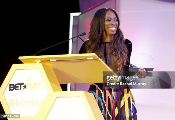 Actress Yvonne Orji speaks onstage during the BET Her Awards Presented By Bumble at Conga Room on June 21, 2018 in Los Angeles, California.