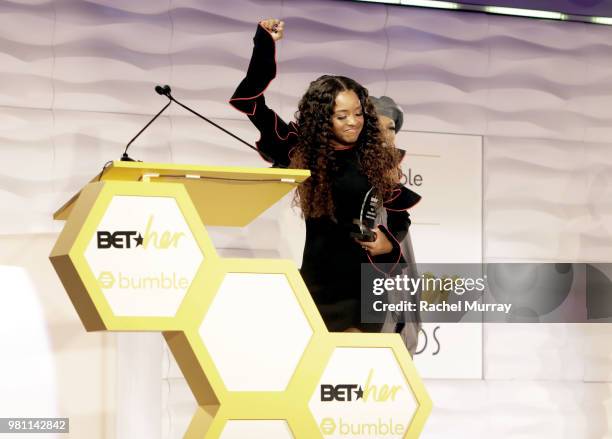 WomenÕs March National co-chair and activist Tamika D. Mallory recieves the Social Justice Award during the BET Her Awards presented by Bumble at...