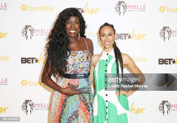 First Mover Award Bozoma recipient Saint John and presenter Elaine Welteroth attend the BET Her Awards presented by Bumble at Conga Room on June 21,...