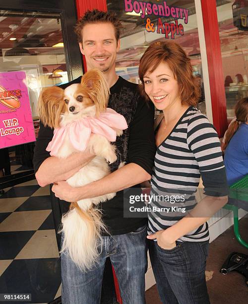 Actress Autumn Reeser and husband Jesse Warren and their dog Gatsby attend Pink's Grand Opening at Knott's Berry Farm on February 28, 2010 in Buena...