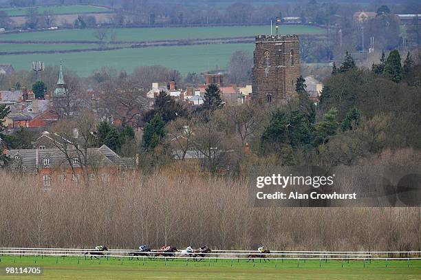 Paddy's Tern and Jason Maguire trail the field early in the race before going on to win The Tipzone At gg.com Handicap Steeple Chase at Towcester...