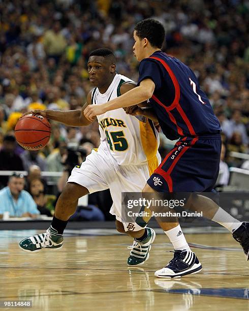 Tweety Carter of the Baylor Bears moves against Jorden Page of the St. Mary's Gaels during the south regional semifinal of the 2010 NCAA men's...