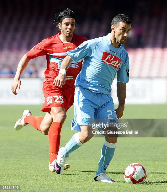 Jorge Martinez of Catania and Fabio Quagliarella of Napoli in action during the Serie A match between SSC Napoli and Catania Calcio at Stadio San...