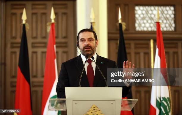 Lebanese Prime Minister Saad Hariri speaks during a press conference with the German Chancellor at his office in the capital Beirut on June 22, 2018...