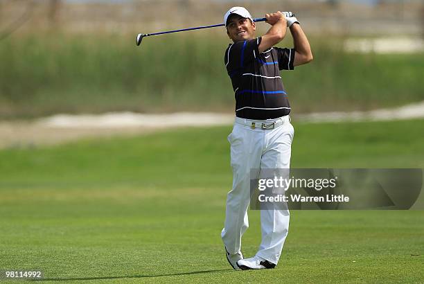 Francesco Molinari of Italy plays his second shot into the 12th green during the fourth round of the Open de Andalucia 2010 at Parador de Malaga Golf...