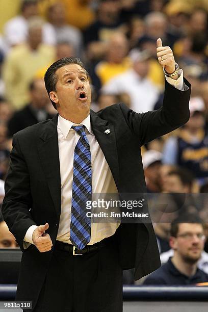 Head coach John Calipari of the Kentucky Wildcats reacts as he coaches against the West Virginia Mountaineers during the east regional final of the...