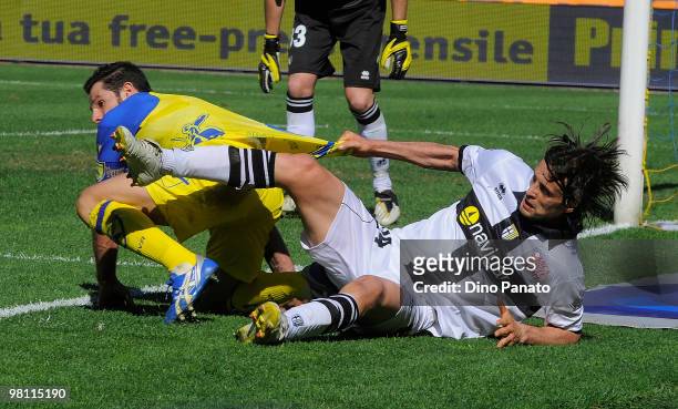Sergio Pellisier of Chievo battles for the ball with Massimo Paci of Parma during the Serie A match between AC Chievo Verona and Parma FC at Stadio...