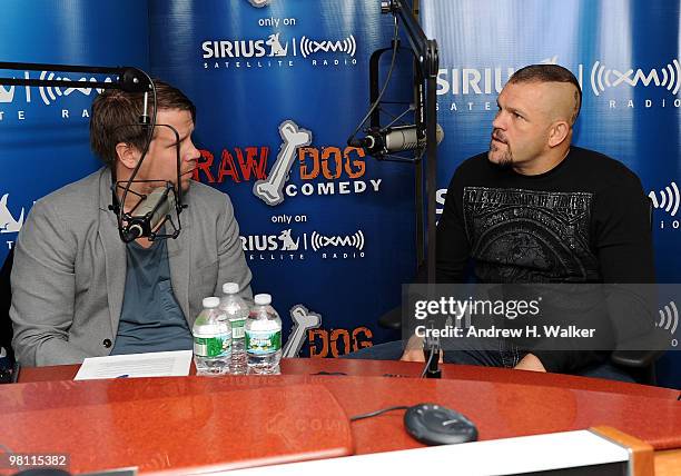 Filip Hammar and Chuck Liddell talk during their visit to the SIRIUS XM Studio on March 29, 2010 in New York City.