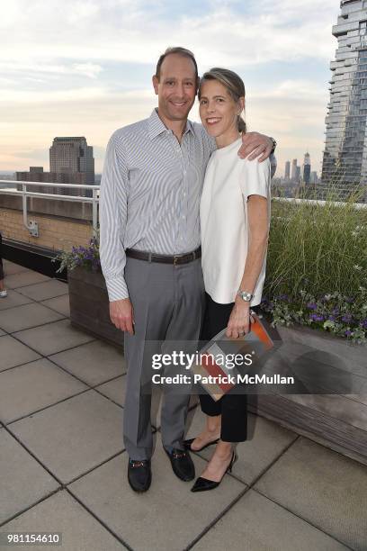 Robert Fogelson and Victoria Voytek attend Summer Birthday Cocktails For Lawrence Kaplan at Tower 270 - Rooftop on June 21, 2018 in New York City.