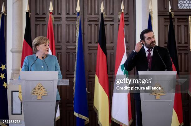 June 2018, Lebanon, Beirut: German Chancellor Angela Merkel and Saad Rafiq Hariri, PM of Lebanon, giving a press conference. Lebanon is the...