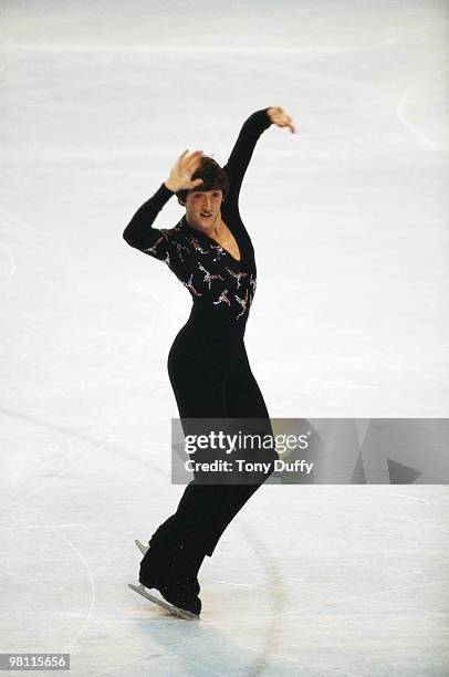 Robin Cousins performing part of his gold medal winning routine during the Free Program of the Men's Figure Skating event on 21 February 1980 during...