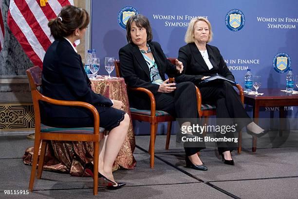 Sheila Bair, chairman of the U.S. Federal Deposit Insurance Corp., center, speaks during the Women in Finance Symposium with Mary Schapiro, chairman...