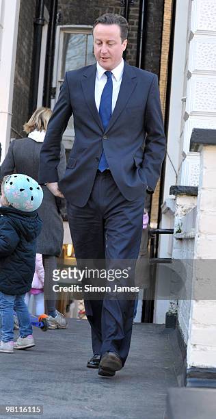 Leader of the Conservative party, David Cameron on the school run on March 5, 2010 in London, England.