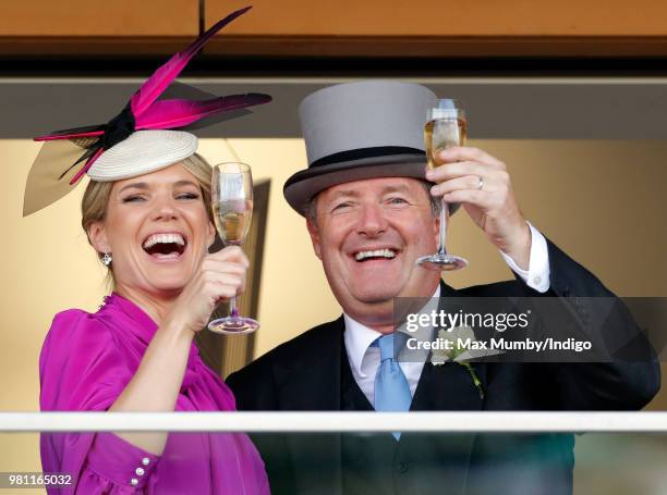 Charlotte Hawkins and Piers Morgan watch the racing on day 2 of Royal Ascot at Ascot Racecourse on June 20, 2018 in Ascot, England.