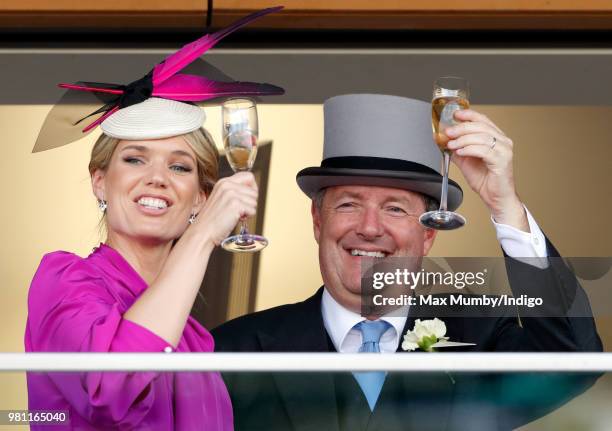 Charlotte Hawkins and Piers Morgan watch the racing on day 2 of Royal Ascot at Ascot Racecourse on June 20, 2018 in Ascot, England.