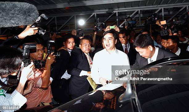 Thai Prime Minister Abhisit Vejjajiva leaves from an Academic Institute after the second round of talks with leaders of the United Front for...